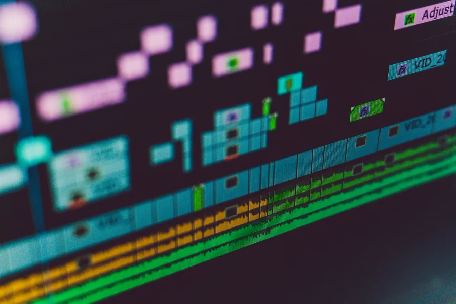 A professional video editor working on a project in editing software
